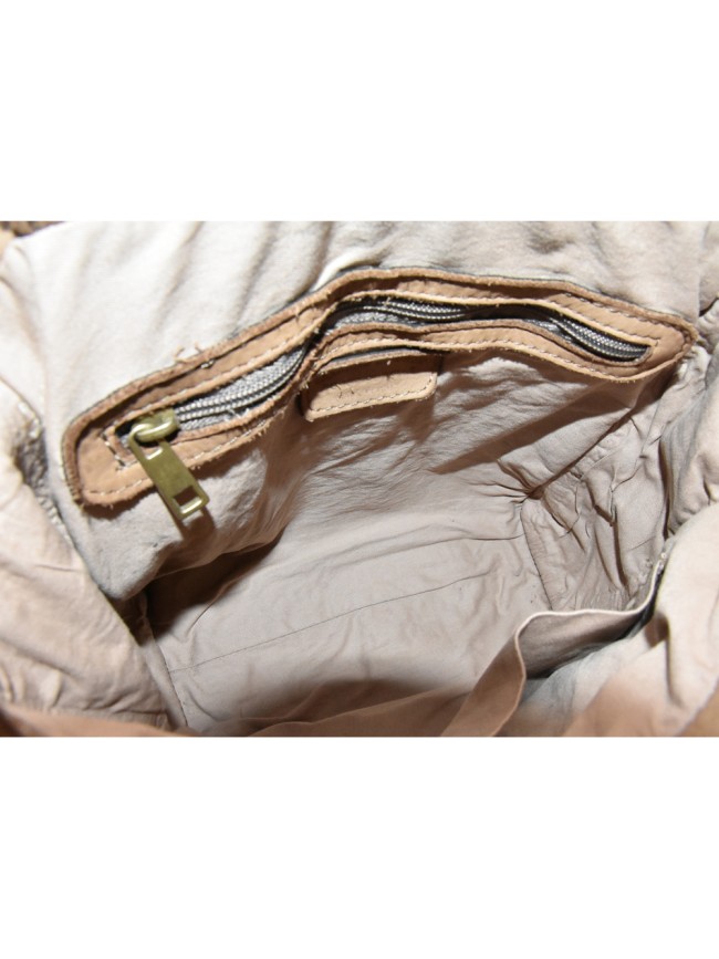 Convertible shoulder bag in backpack...