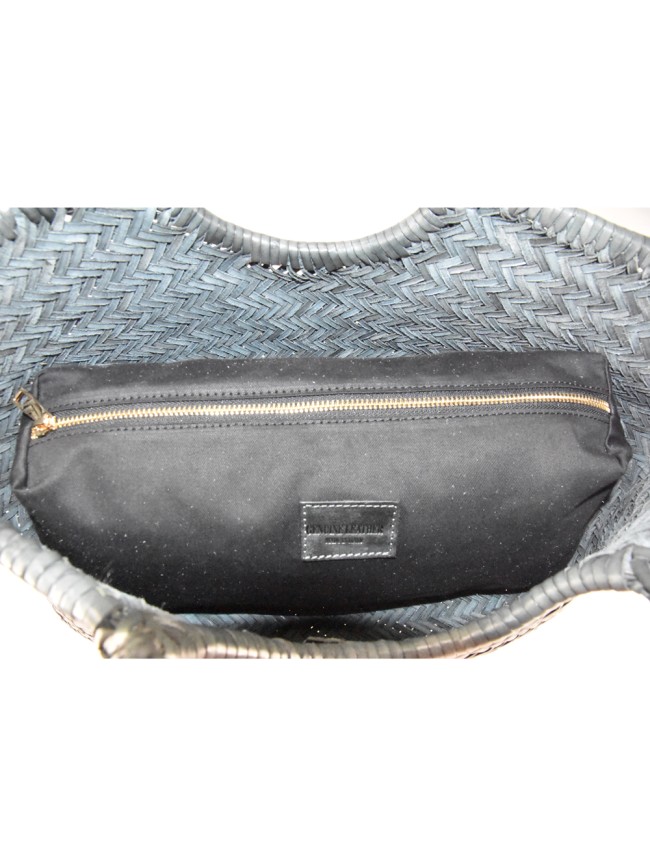 Woman hand woven vintage leather... Woman hand woven vintage leather...