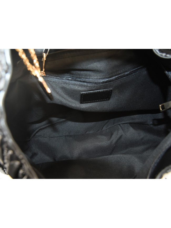 Woman quilted synthetic leather hand...